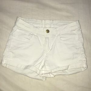 white h&m shorts with gold detailing